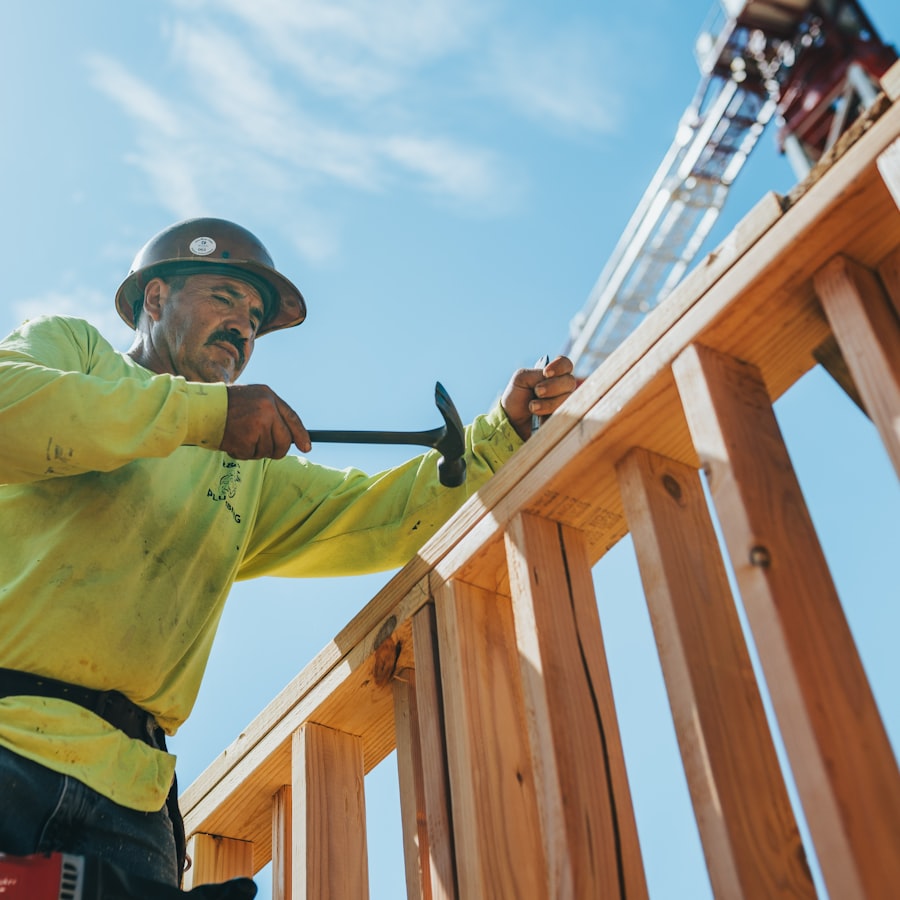 Construction workers assembling a timber frame